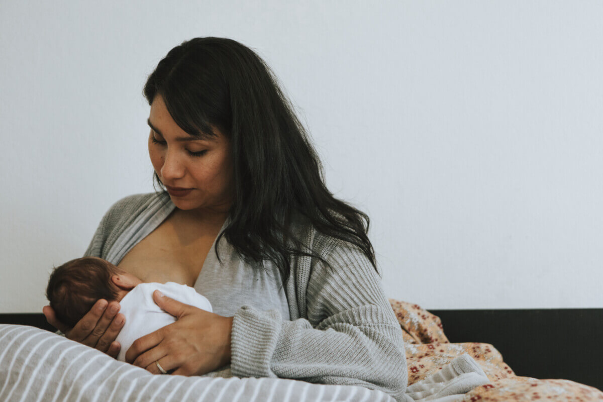 Mother breastfeeding baby