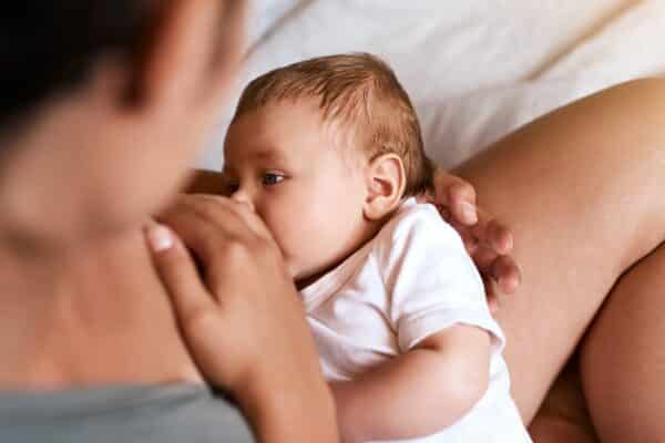 A mother breastfeeding her baby