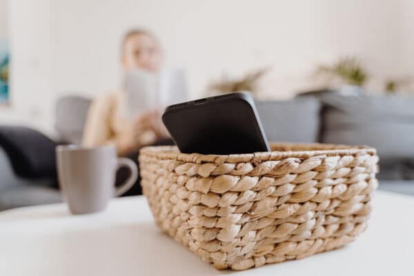 A woman reading instead of being on her phone