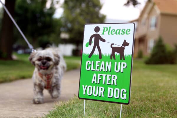 "Clean Up After Your Dog" sign at park