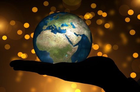 Hand holding Earth