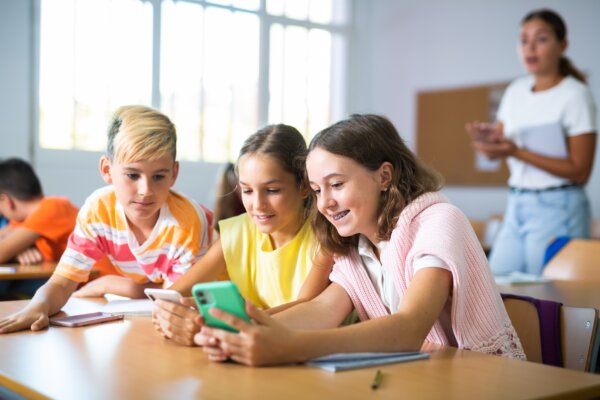 Students using their smartphones during class