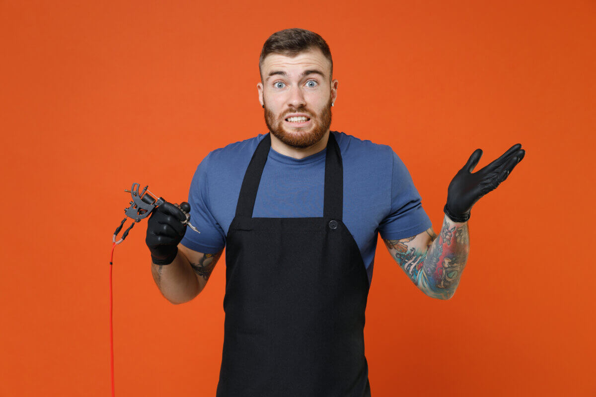 Confused tattoo artist