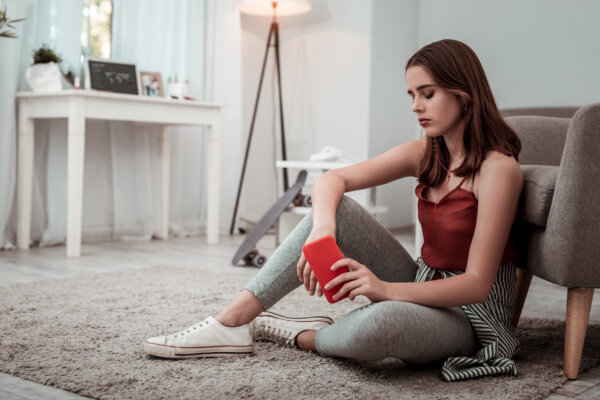 Stressed teen girl listening to music